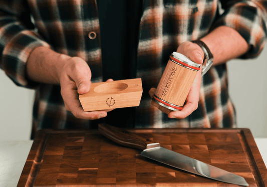 Oakstone roller and angle base beside a knife on a chopping board