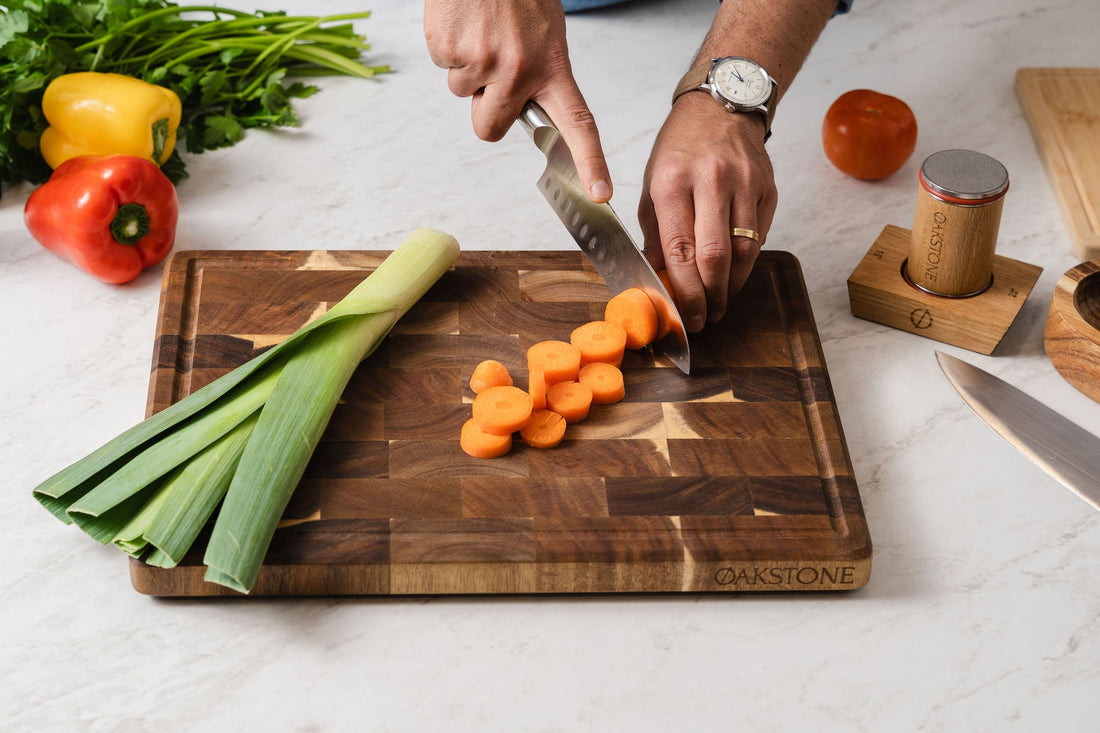 Cutting carrots on an Oakstone wooden board